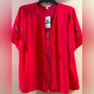 Woman’s zip front blouse